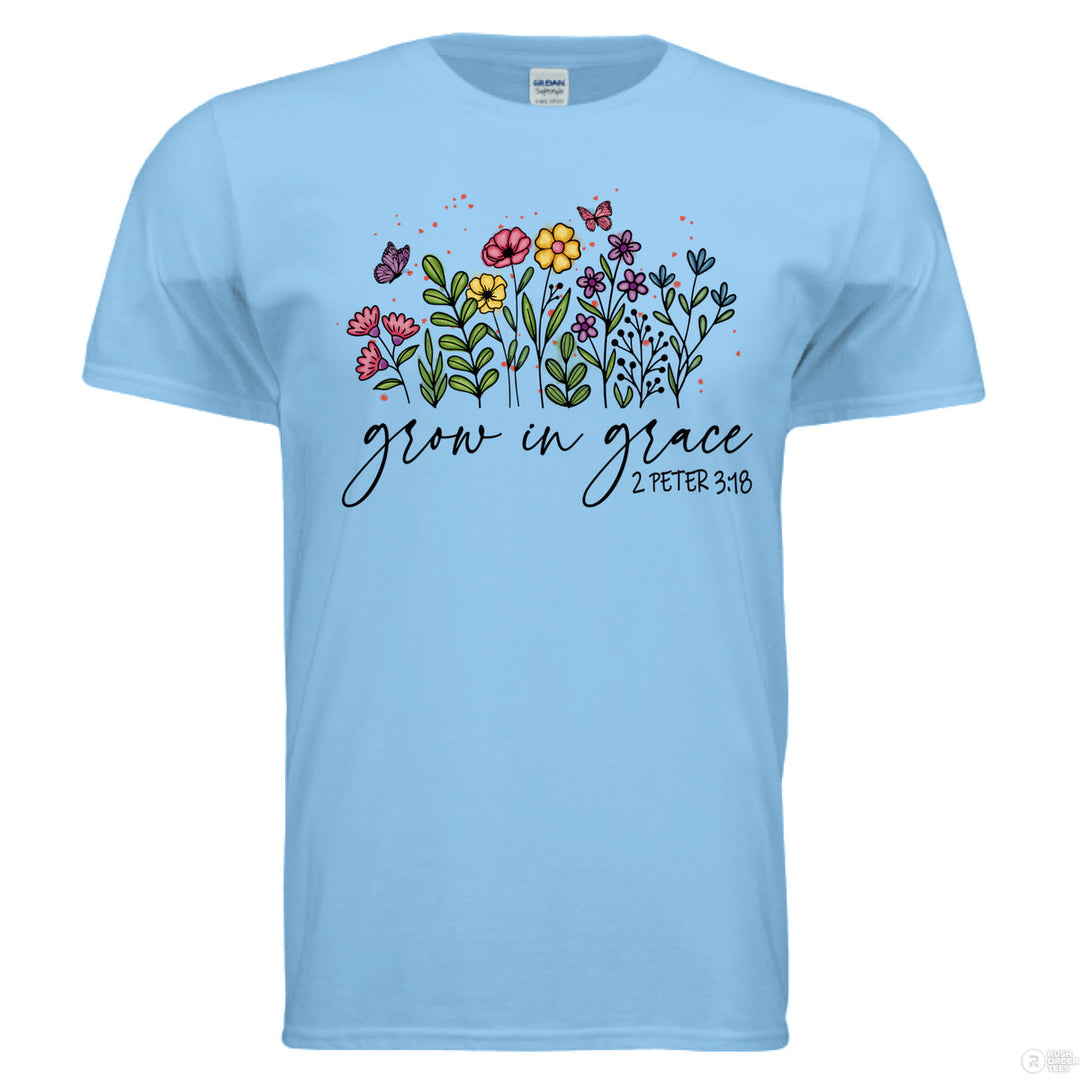 Sky shirt featuring hand-drawn colorful flowers and butterflies, with “Grow in Grace” and 2 Peter 3:18 written in script across the front.