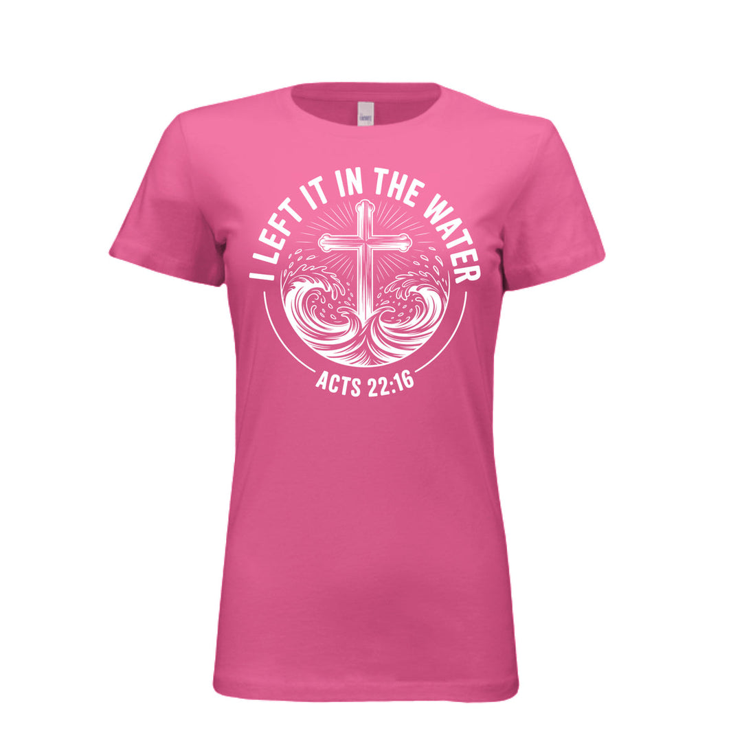 Women's fitted berry tee featuring a white cross rising from stylized waves with the words “I Left It in the Water – Acts 22:16” in bold curved text