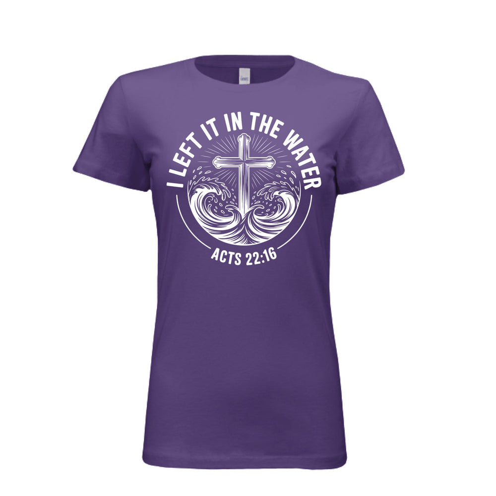 Women's fitted purple tee featuring a white cross rising from stylized waves with the words “I Left It in the Water – Acts 22:16” in bold curved text