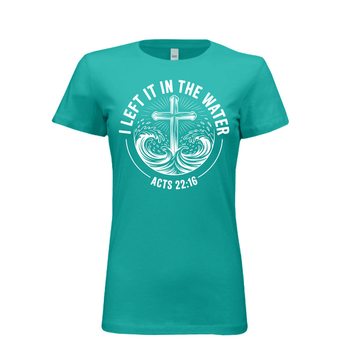Women's fitted teal tee featuring a white cross rising from stylized waves with the words “I Left It in the Water – Acts 22:16” in bold curved text