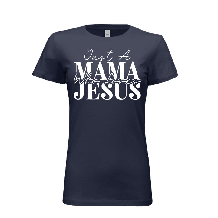 Women's navy blue t-shirt with white text reading "Just A Mama Who Loves Jesus" in bold and script fonts—a bold statement of faith and motherhood.