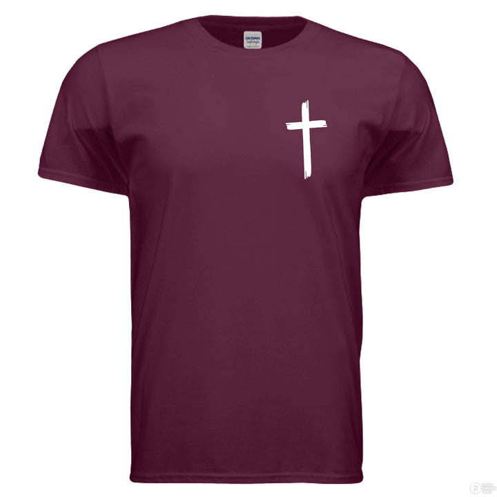 Maroon Christian t-shirt with bold white text reading ‘Not by my strength but His’ and a large cross forming the letter T in STRENGTH